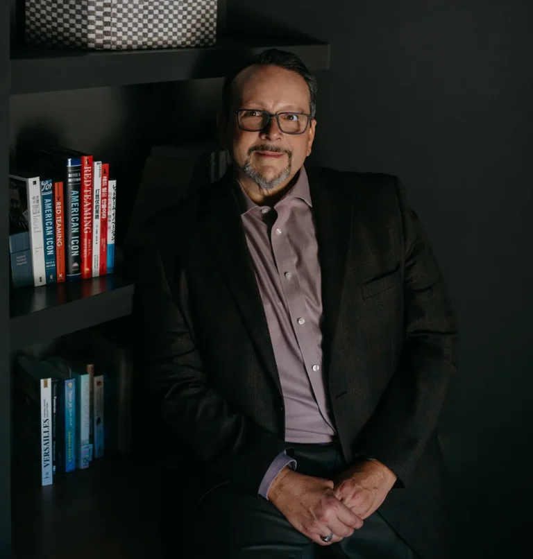 A portrait of Bryce Hoffman in his office