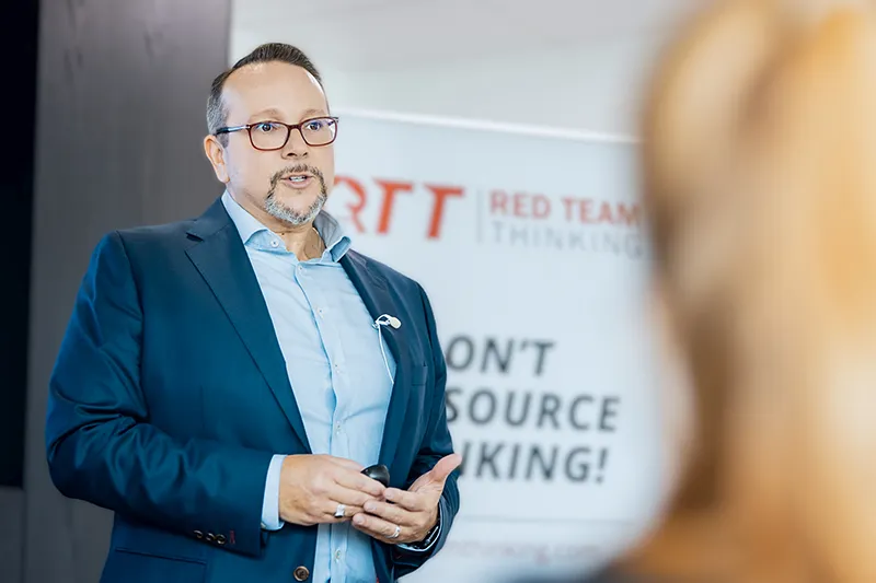 Bryce Hoffman speaking at a Red Teaming event